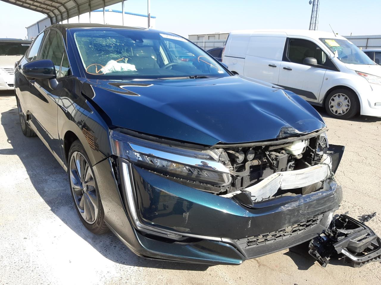 HONDA CLARITY 2018 with VIN JHMZC5F10JC014040 - Photo from auction