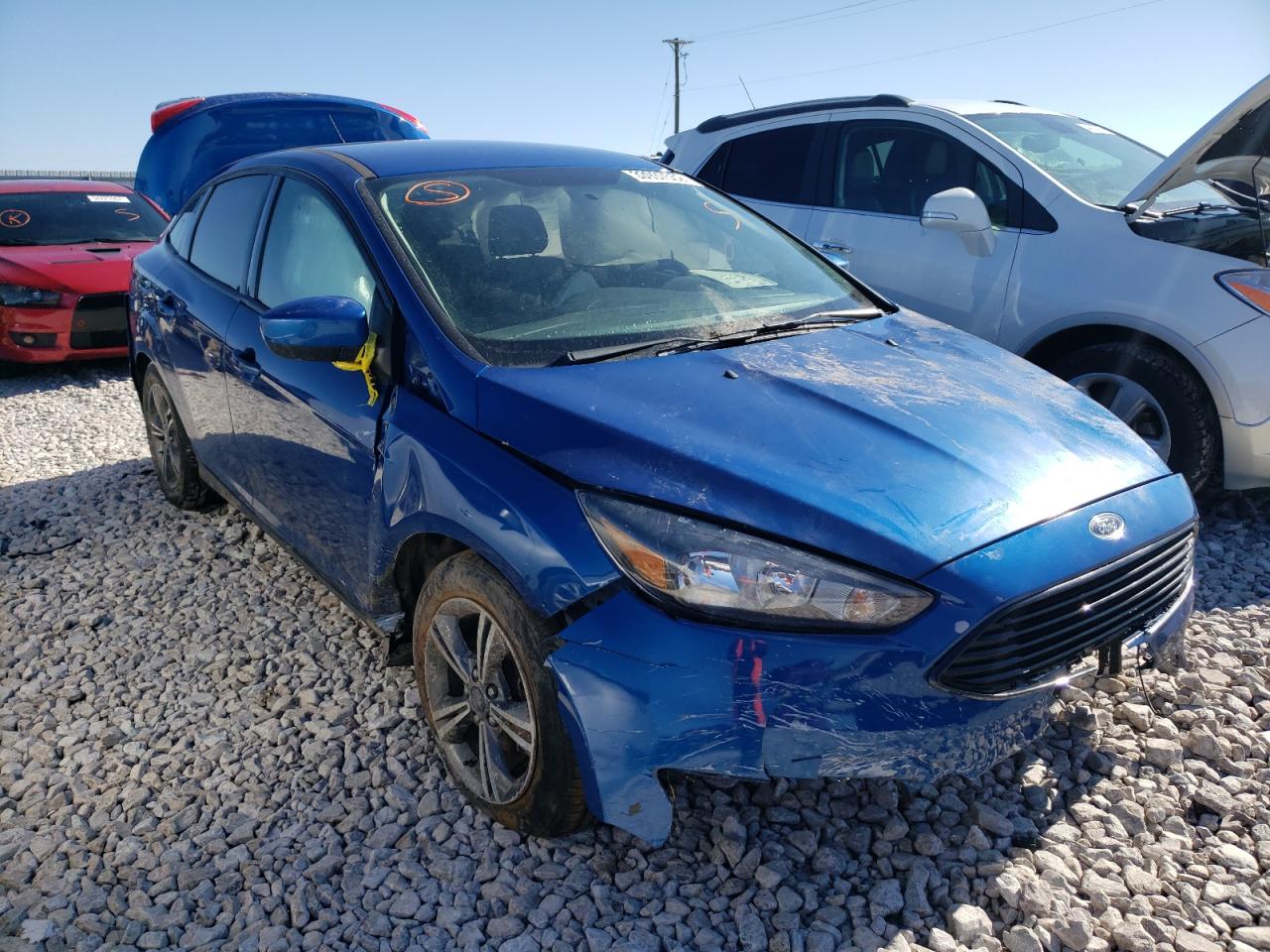 FORD FOCUS SE 2018 con VIN 1FADP3FE8JL276885 - Foto de la subasta