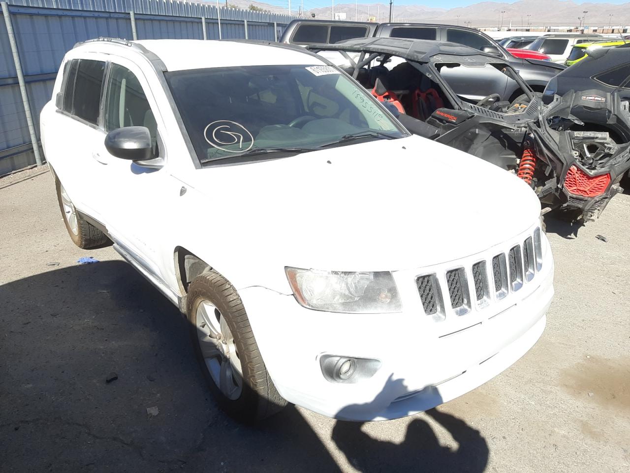 JEEP COMPASS SP 2014 with VIN 1C4NJDBB6ED815831 - Photo from auction