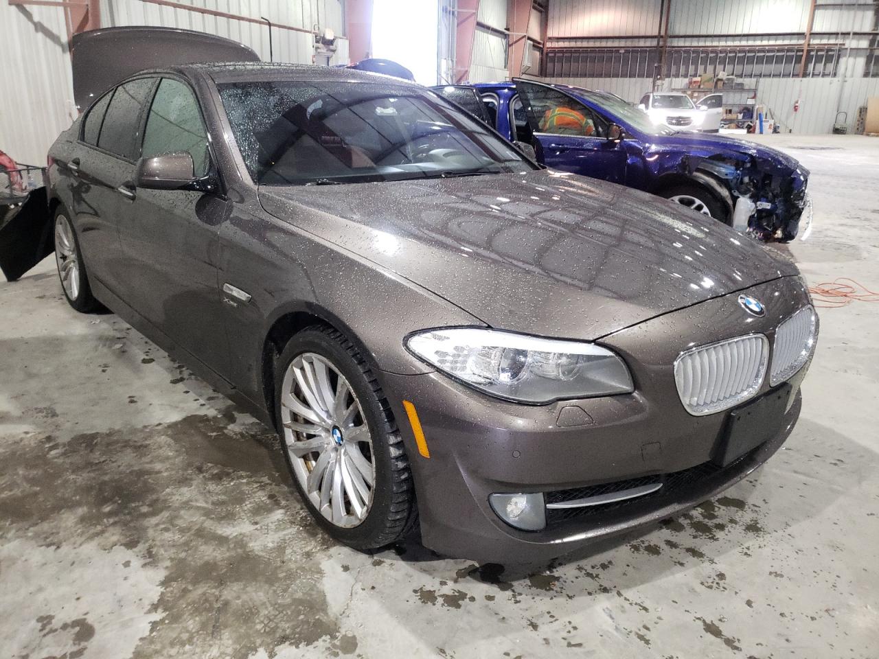 BMW 550 XI 2011 with VIN WBAFU9C59BC786423 - Photo from auction