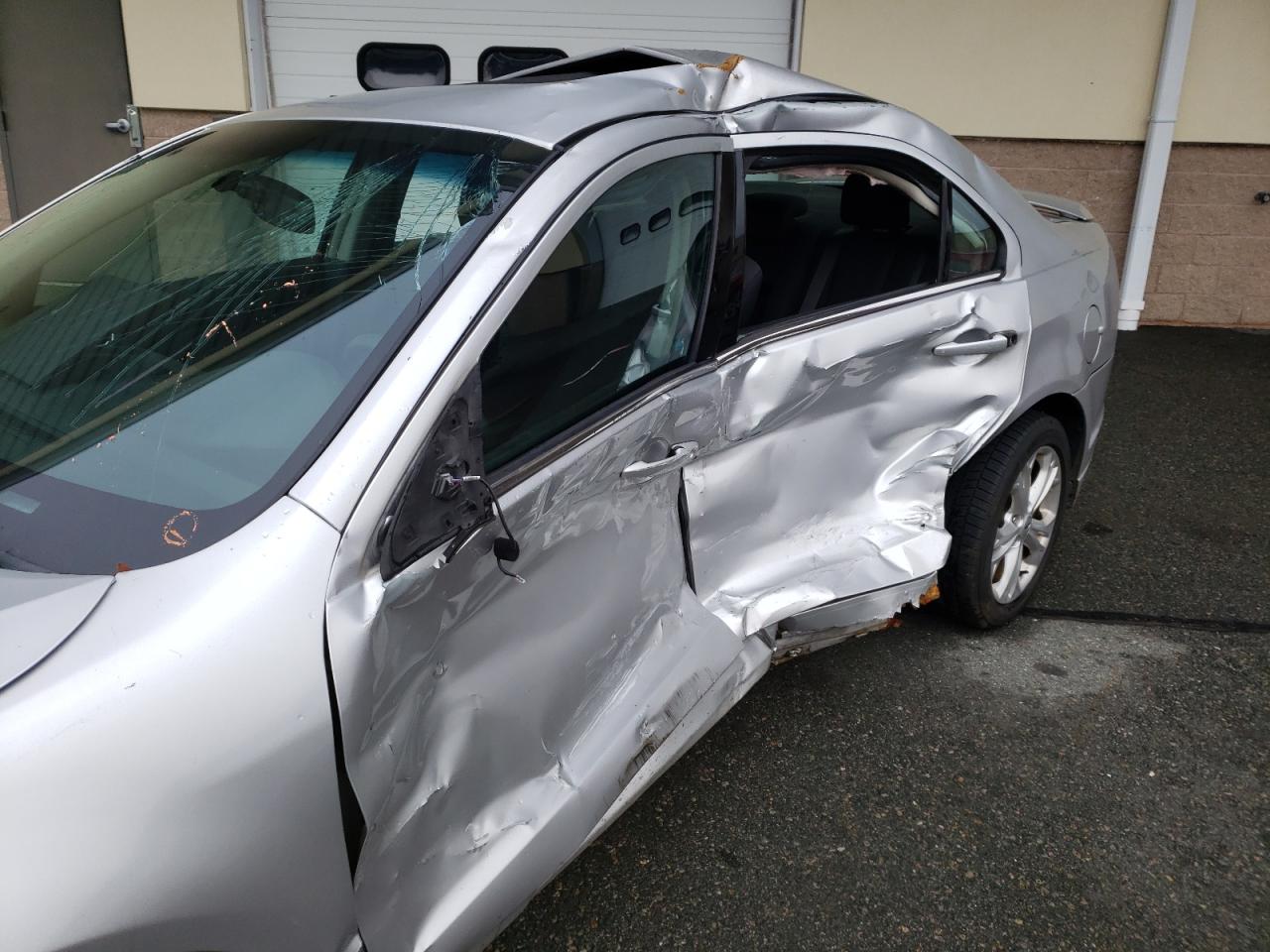 Photo 9 from auction – 2012 FORD FUSION with VIN 3FAHP0HA0CR370242