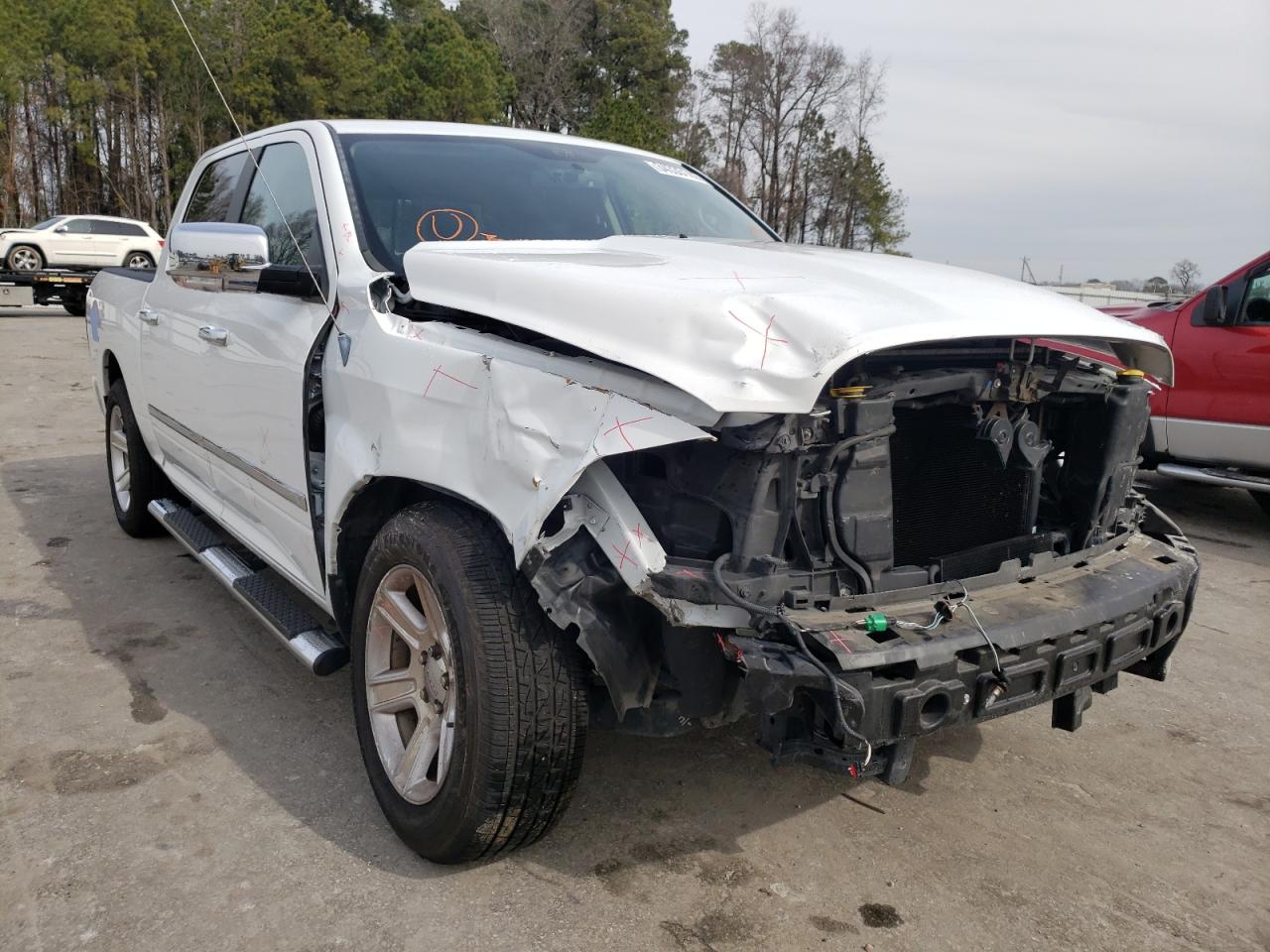 DODGE RAM 1500 L 2012 with VIN 1C6RD6PT8CS334386 - Photo from auction