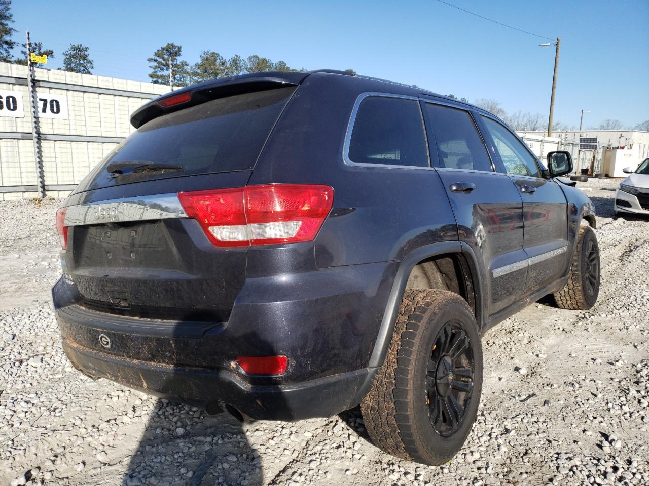 Photo 4 from auction – 2013 JEEP GRAND CHER with VIN 1C4RJFAT4DC571379
