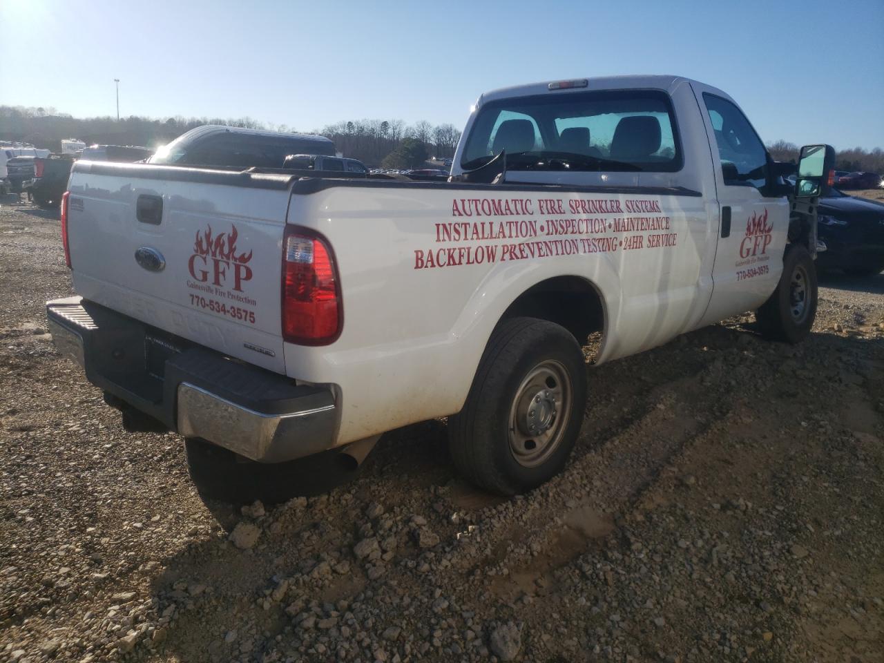Photo 4 from auction – 2013 FORD F250 SUPER with VIN 1FTBF2A64DEA24302