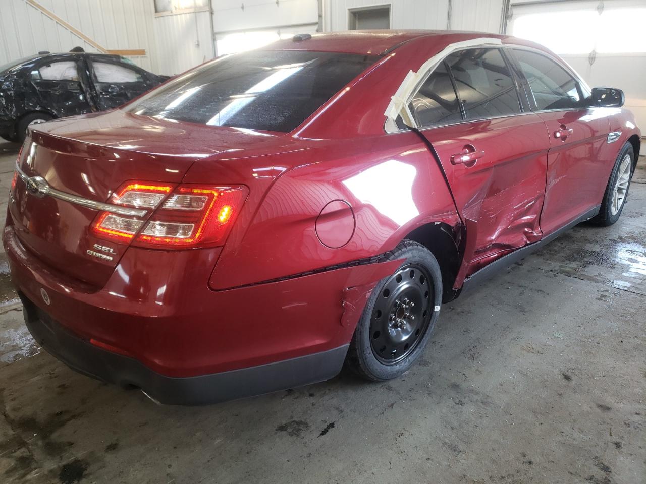 Photo 4 from auction – 2015 FORD TAURUS SEL with VIN 1FAHP2E88FG177023