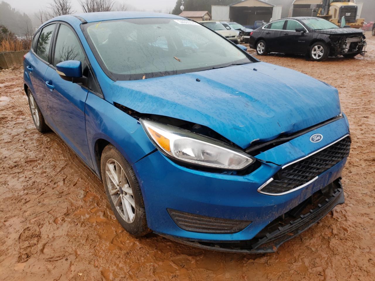 FORD FOCUS SE 2015 with VIN 1FADP3K21FL276097 - Photo from auction