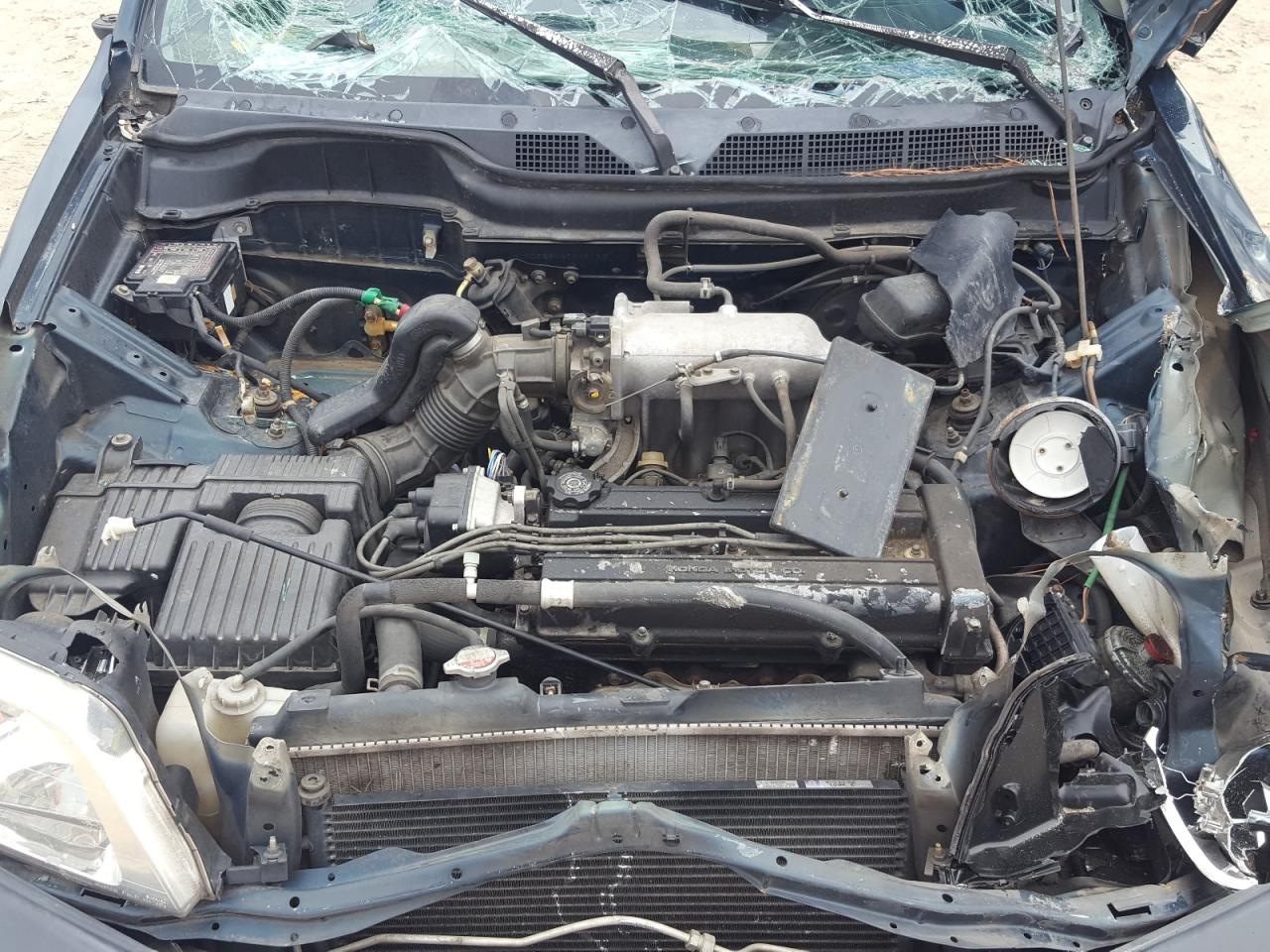 Photo 7 from auction – 1998 HONDA CR-V LX with VIN JHLRD2844WC016193