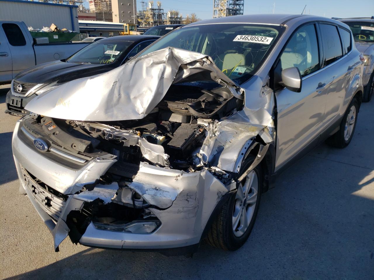 Photo 2 from auction – 2016 FORD ESCAPE SE with VIN 1FMCU0GX0GUC05837