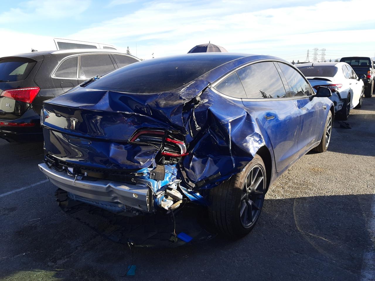 Photo 4 from auction – 2021 TESLA MODEL 3 with VIN 5YJ3E1EA9MF051137