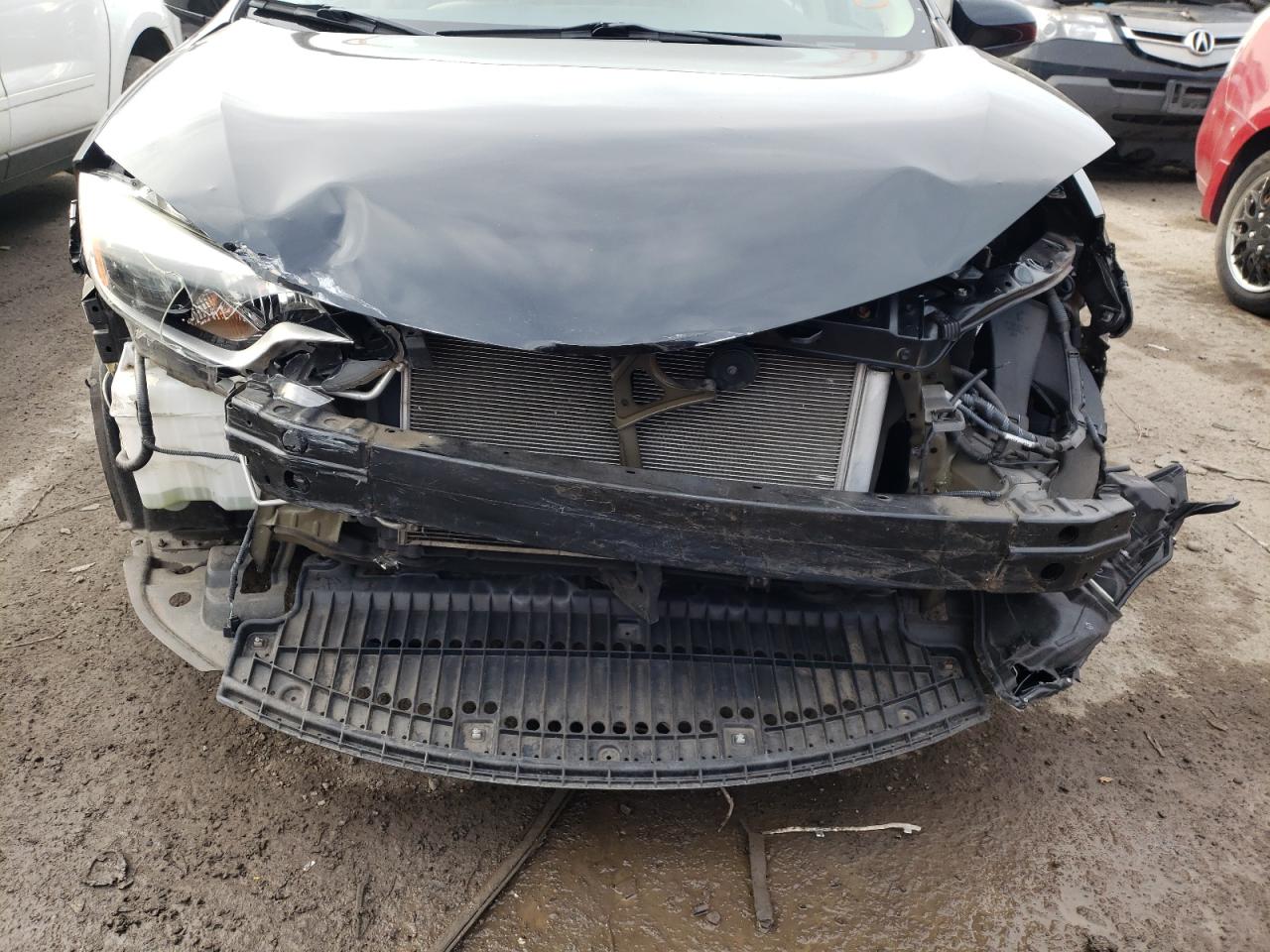 Photo 9 from auction – 2014 TOYOTA COROLLA L with VIN 5YFBURHE7EP011687