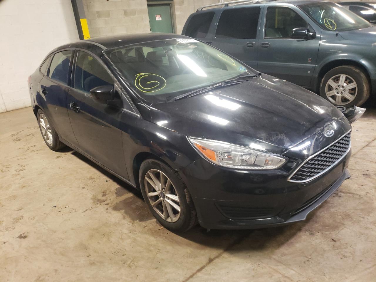 FORD FOCUS SE 2018 with VIN 1FADP3F23JL214610 - Photo from auction