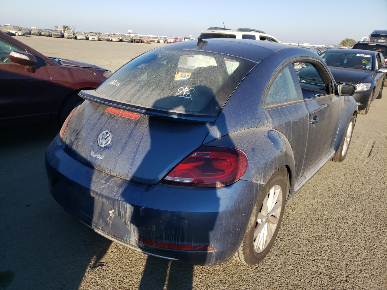 Photo 4 from auction – 2017 VOLKSWAGEN BEETLE SE with VIN 3VWJ17AT9HM606728