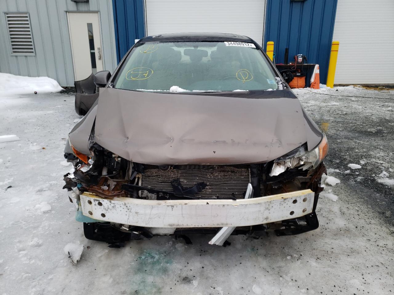 Photo 9 from auction – 2012 HONDA CIVIC LX with VIN 2HGFB2F58CH062640