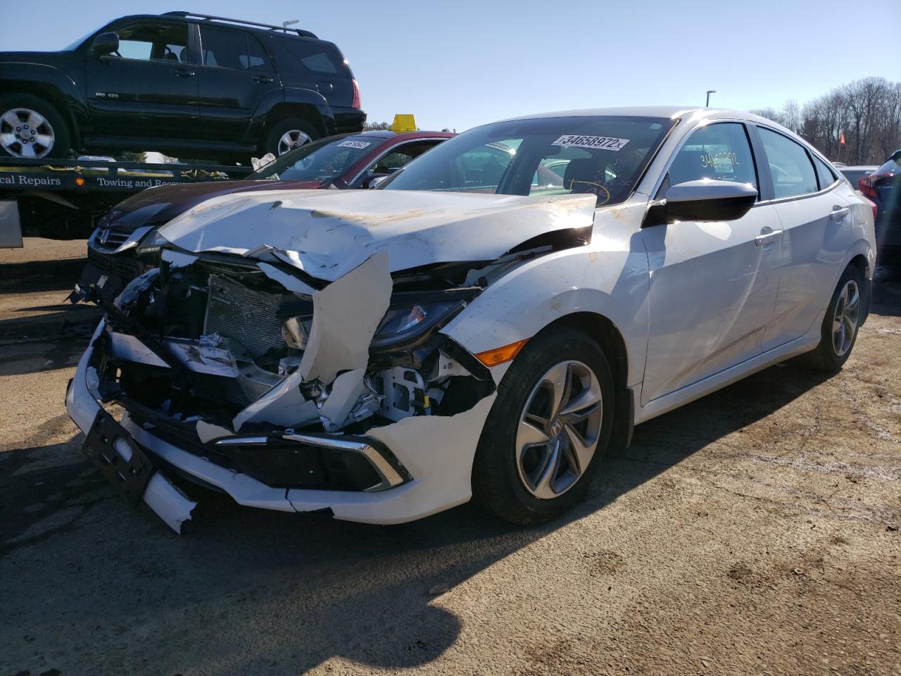 Photo 2 from auction – 2019 HONDA CIVIC LX with VIN 2HGFC2F69KH540004