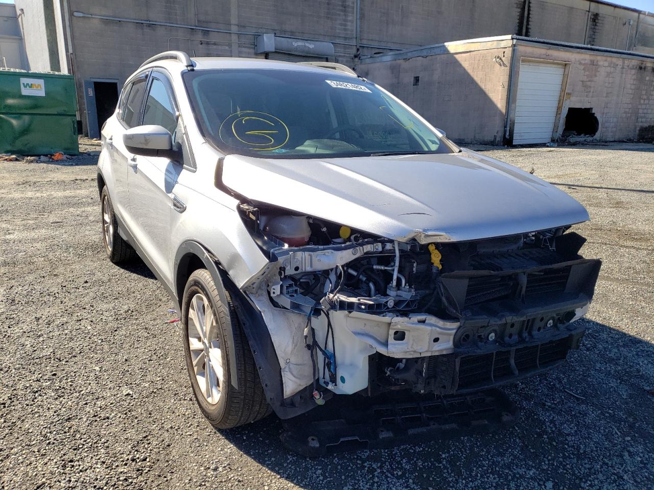 FORD ESCAPE SE 2018 with VIN 1FMCU0GD2JUA80076 - Photo from auction