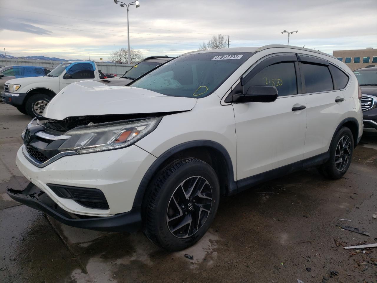 Photo 2 from auction – 2016 HONDA CR-V SE with VIN 5J6RM3H45GL012877