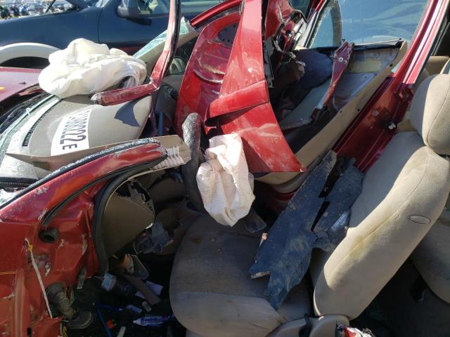 Photo 5 from auction – 2000 FORD FOCUS SE with VIN 1FAHP3437YW294578