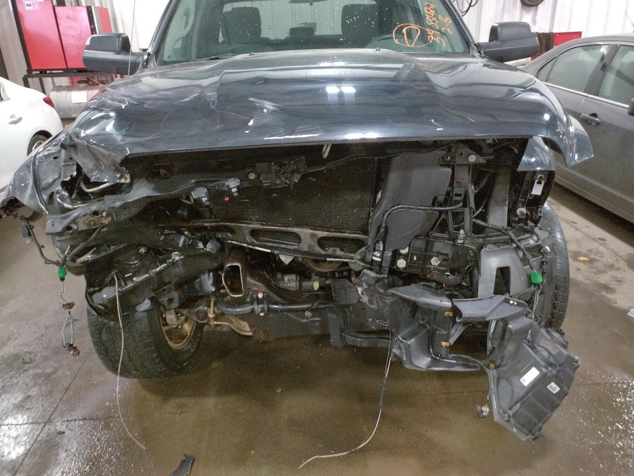 Photo 9 from auction – 2014 RAM 1500 ST with VIN 1C6RR7FT2ES119226