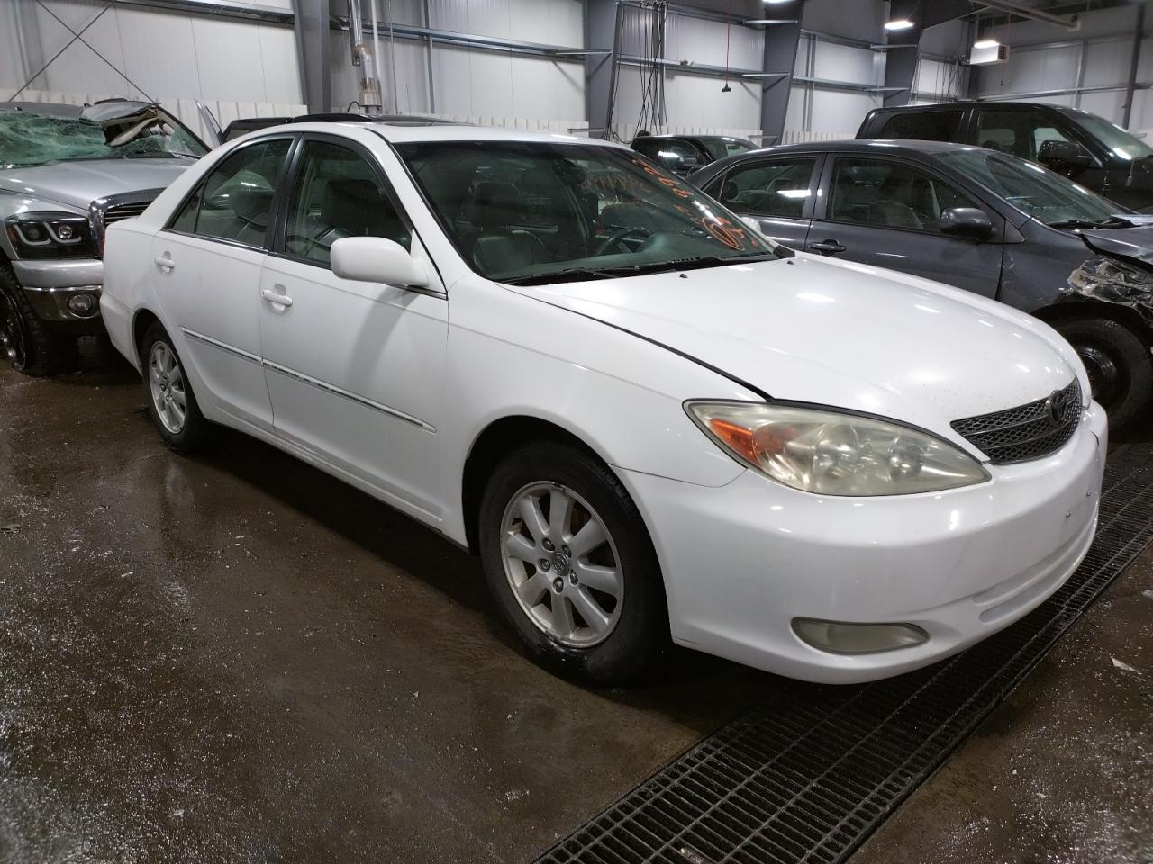 TOYOTA CAMRY LE 2004 with VIN 4T1BE30K44U271554 - Photo from auction
