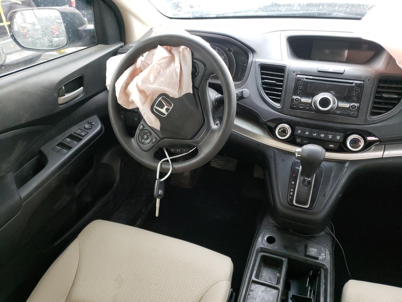 Photo 9 from auction – 2016 HONDA CR-V SE with VIN 5J6RM3H45GL012877