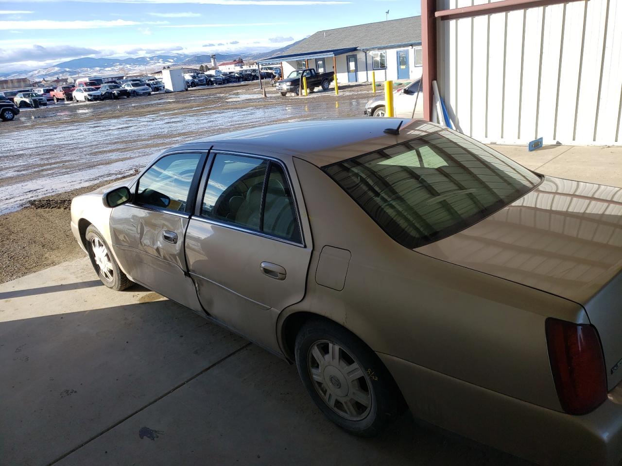Photo 9 from auction – 2005 CADILLAC DEVILLE with VIN 1G6KD54Y75U246072