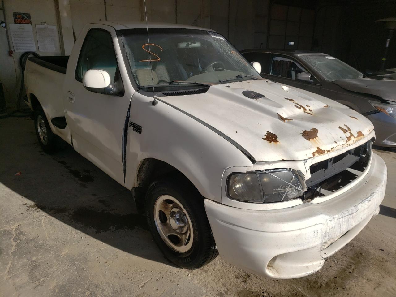 FORD F150 2000 with VIN 2FTZF0721YCA62797 - Photo from auction