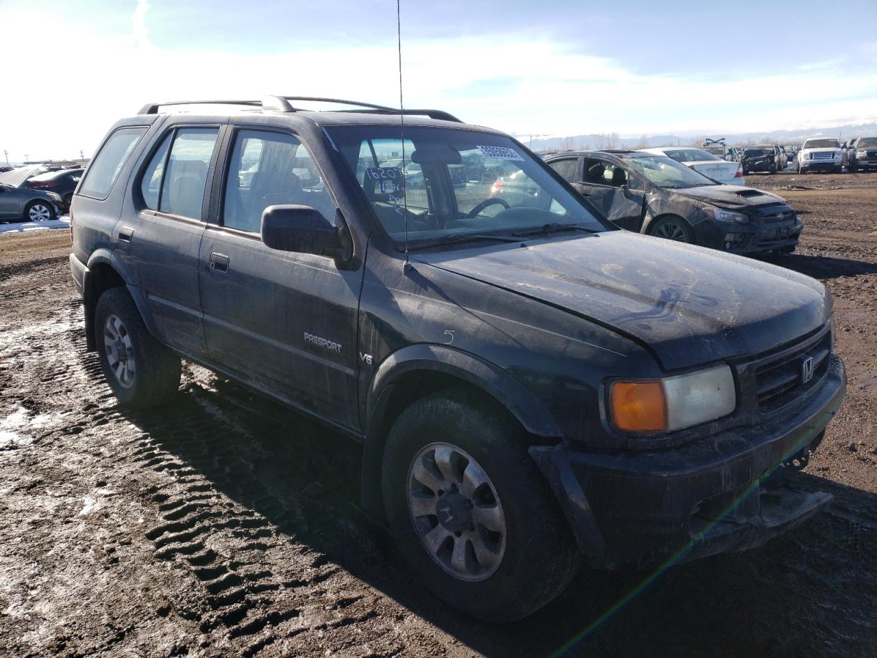 Photo 1 from auction – 1999 HONDA PASSPORT E with VIN 4S6CM58WXX4418272