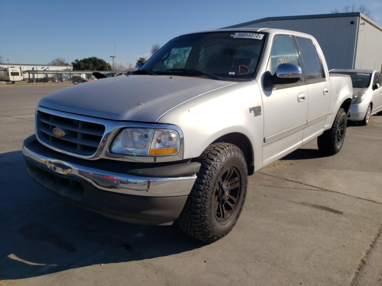 Photo 2 from auction – 2002 FORD F150 SUPER with VIN 1FTRW07L02KB89553