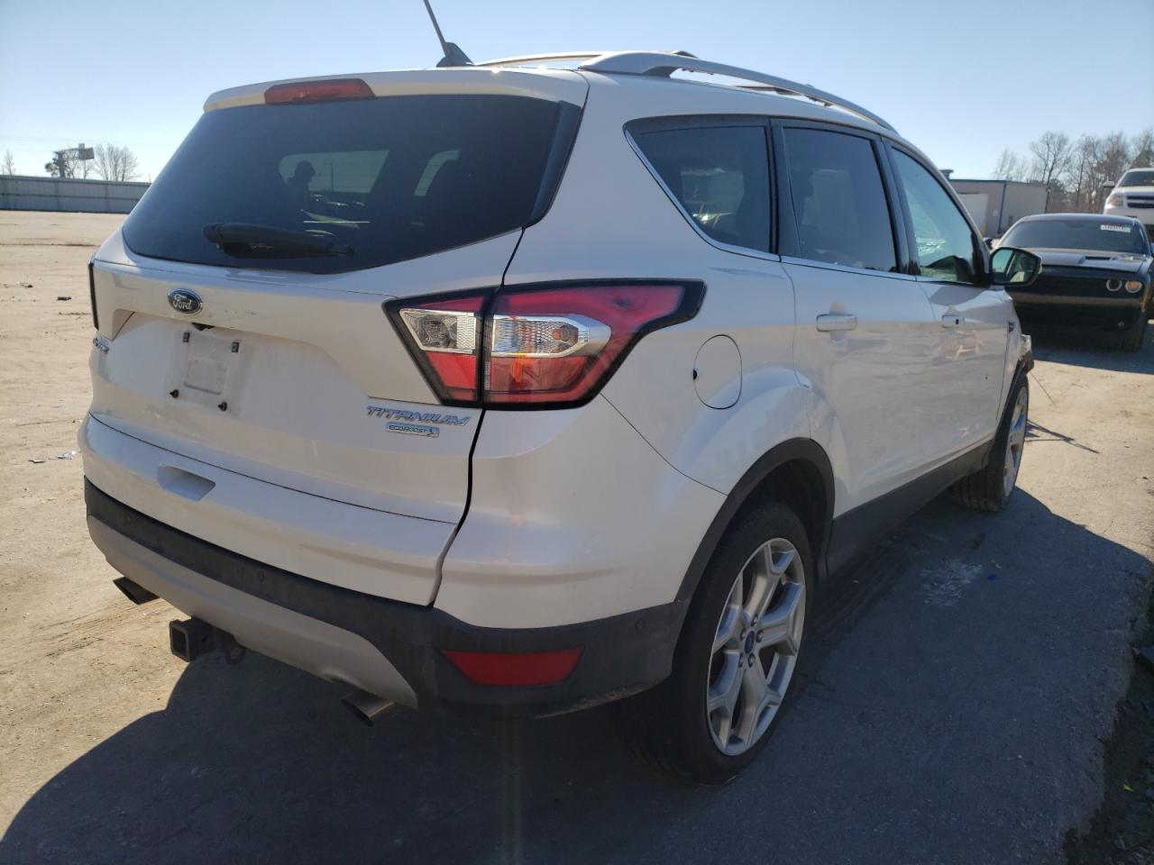 Photo 4 from auction – 2018 FORD ESCAPE TIT with VIN 1FMCU0J99JUA66518