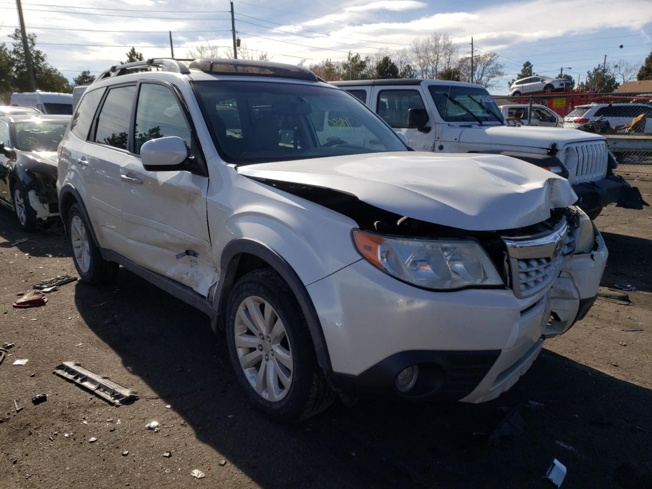 SUBARU FORESTER 2012 with VIN JF2SHBEC1CH413049 - Photo from auction