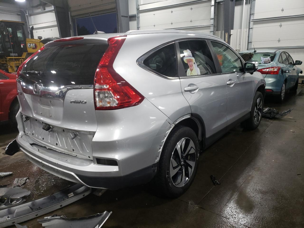 Photo 4 from auction – 2016 HONDA CR-V TOURI with VIN 5J6RM4H90GL015459