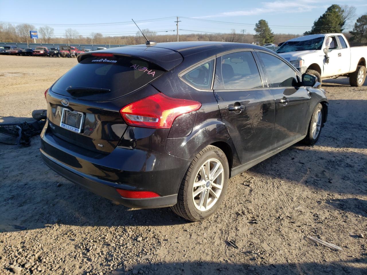 Photo 4 from auction – 2018 FORD FOCUS SE with VIN 1FADP3K2XJL251417