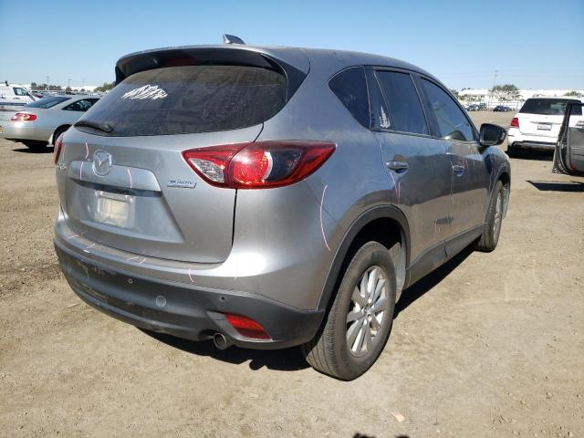Photo 4 from auction – 2014 MAZDA CX-5 SPORT with VIN JM3KE2BE0E0398887
