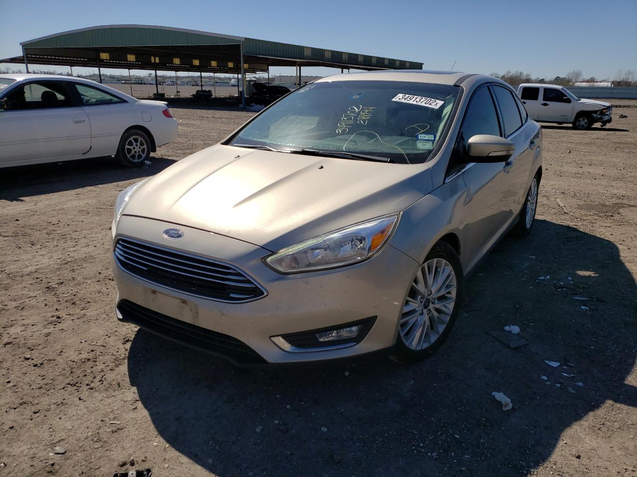 Photo 2 from auction – 2017 FORD FOCUS TITA with VIN 1FADP3J29HL288194