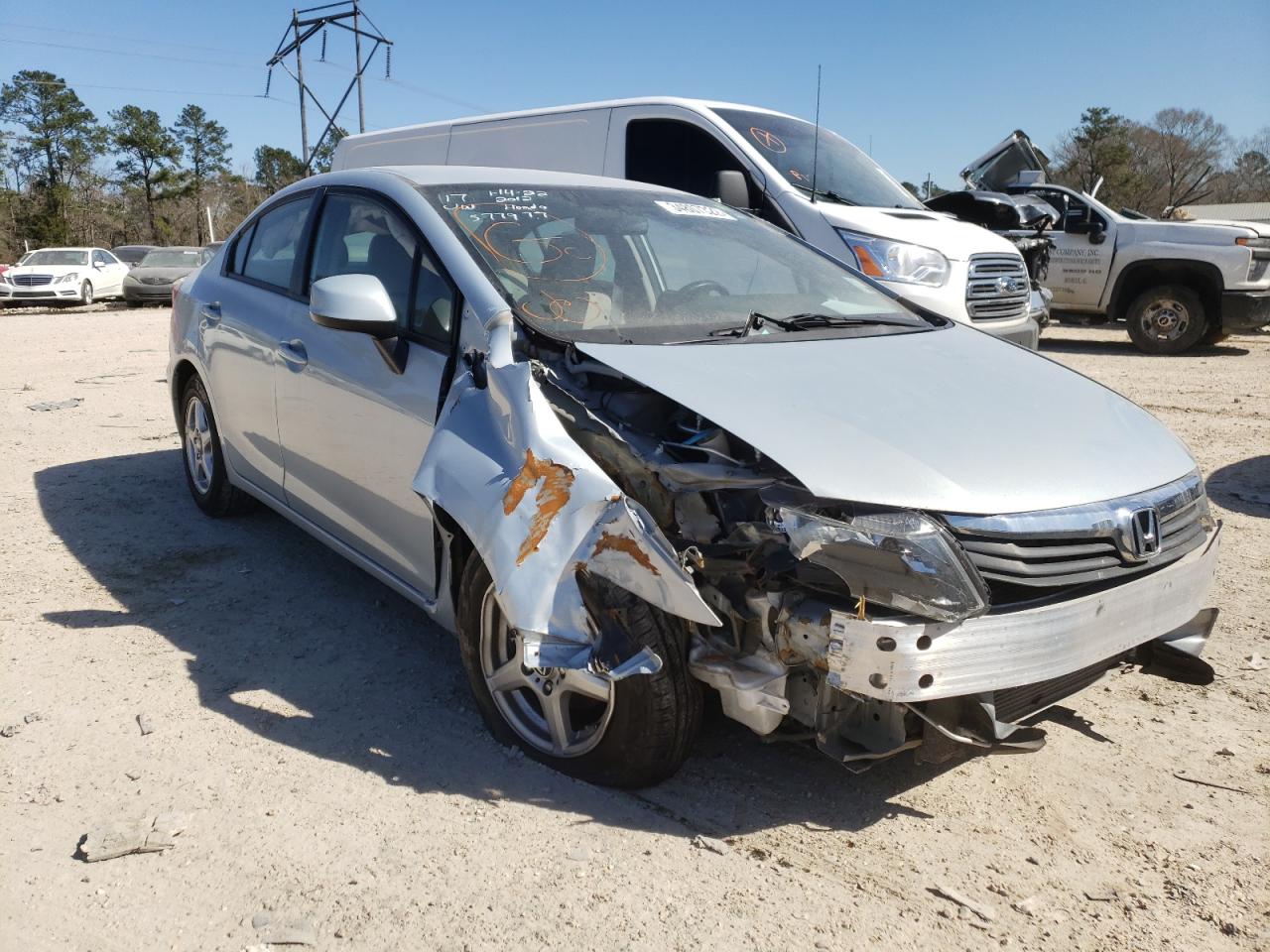 HONDA CIVIC LX 2012 with VIN 2HGFB2F5XCH577977 - Photo from auction