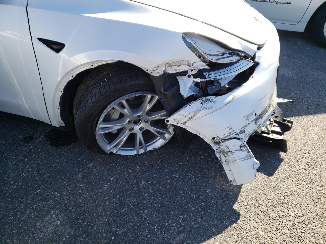 Photo 9 from auction – 2021 TESLA MODEL Y with VIN 5YJYGDEE5MF066402