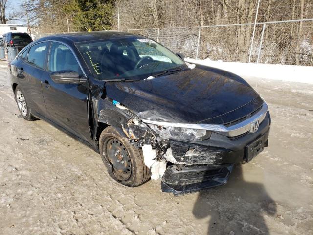 HONDA CIVIC LX 2018 with VIN 2HGFC2F57JH595010 - Photo from auction