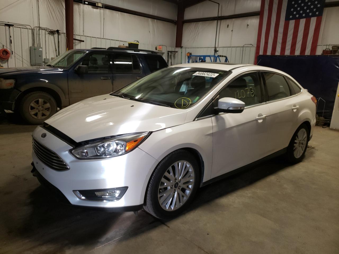 Photo 2 from auction – 2018 FORD FOCUS TITA with VIN 1FADP3J27JL246760
