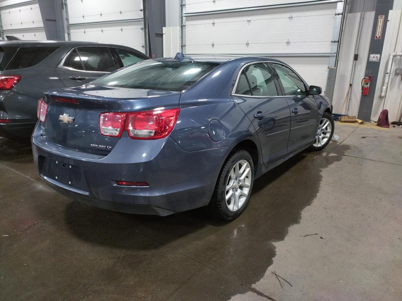 Photo 4 from auction – 2014 CHEVROLET MALIBU 1LT with VIN 1G11C5SL5EF249570