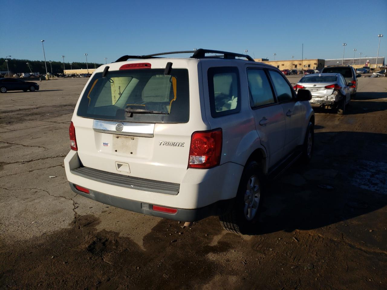 Photo 4 from auction – 2011 MAZDA TRIBUTE with VIN 4F2CY0C74BKM00097