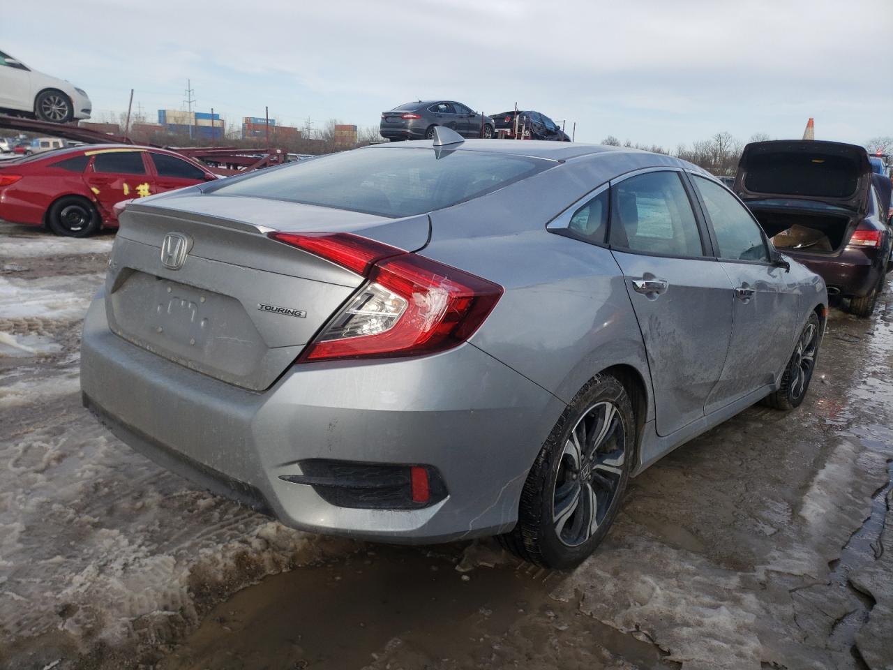 Photo 4 from auction – 2016 HONDA CIVIC TOUR with VIN 19XFC1F97GE024472