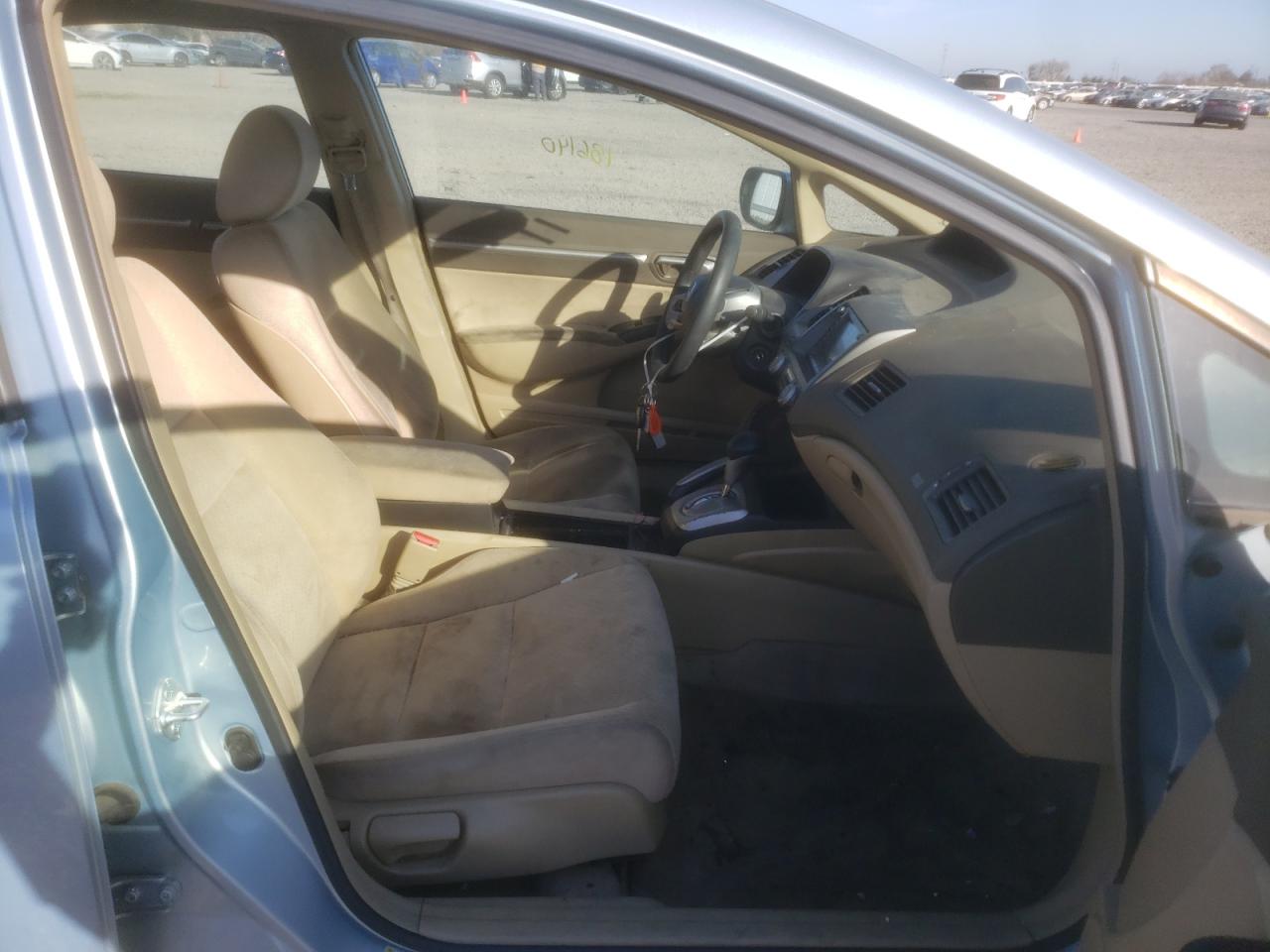 Photo 5 from auction – 2006 HONDA CIVIC HYBR with VIN JHMFA362X6S004375