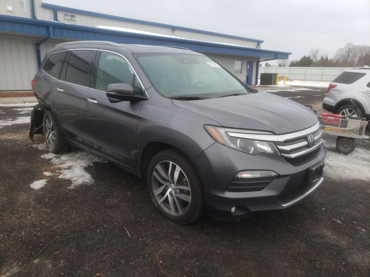 Photo 1 from auction – 2018 HONDA PILOT TOUR with VIN 5FNYF6H97JB009854
