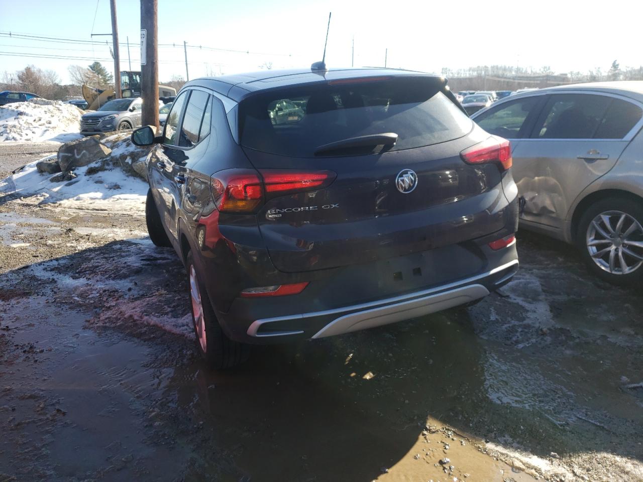 Photo 3 from auction – 2021 BUICK ENCORE GX with VIN KL4MMCSL9MB093149