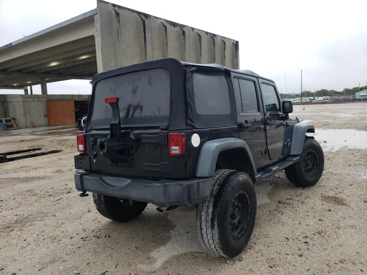 Photo 4 from auction – 2014 JEEP WRANGLER U with VIN 1C4BJWDGXEL134925