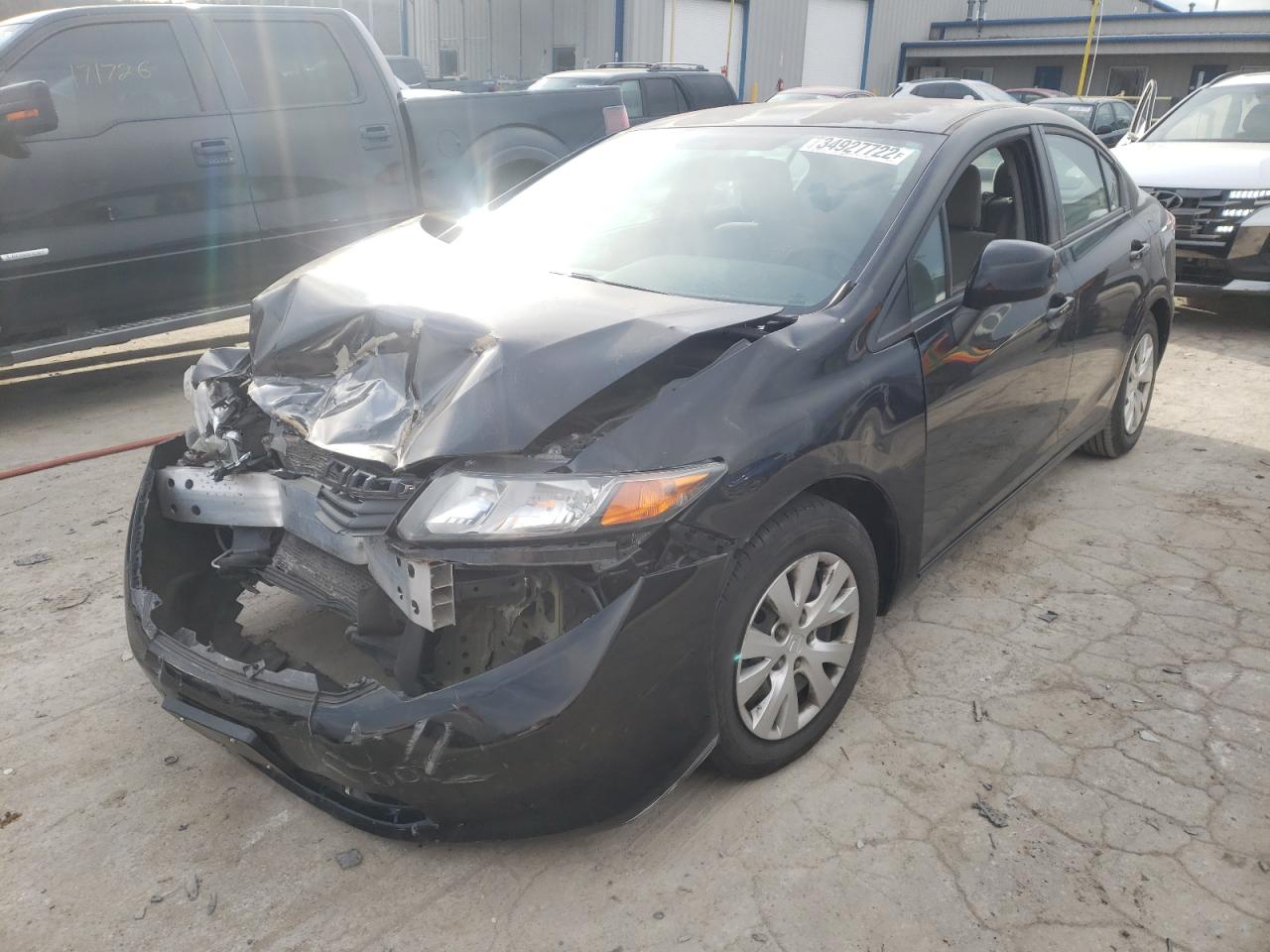 Photo 2 from auction – 2012 HONDA CIVIC LX with VIN 2HGFB2F54CH563475