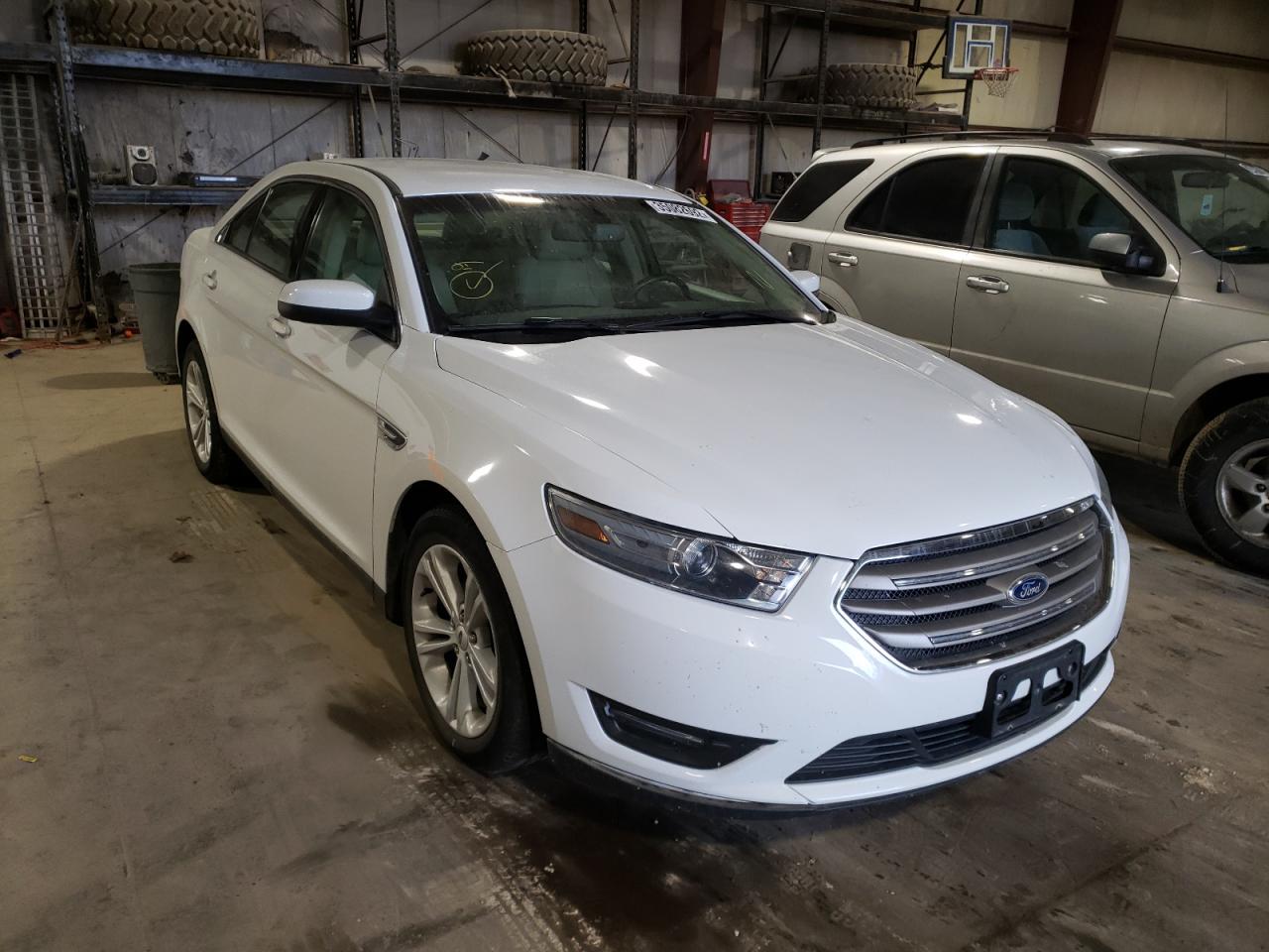 FORD TAURUS SEL 2014 with VIN 1FAHP2E83EG155932 - Photo from auction