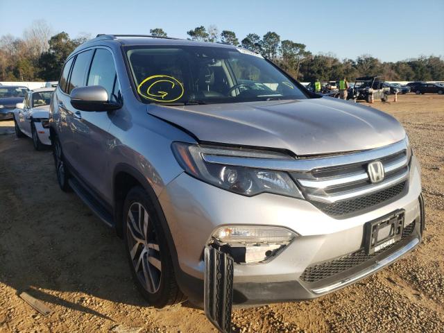 HONDA PILOT ELIT 2017 with VIN 5FNYF6H00HB034557 - Photo from auction