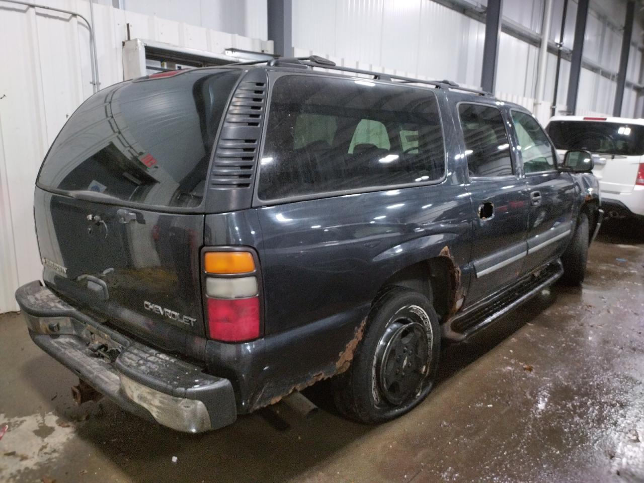 Photo 4 from auction – 2004 CHEVROLET SUBURBAN K with VIN 1GNFK16Z44J322891