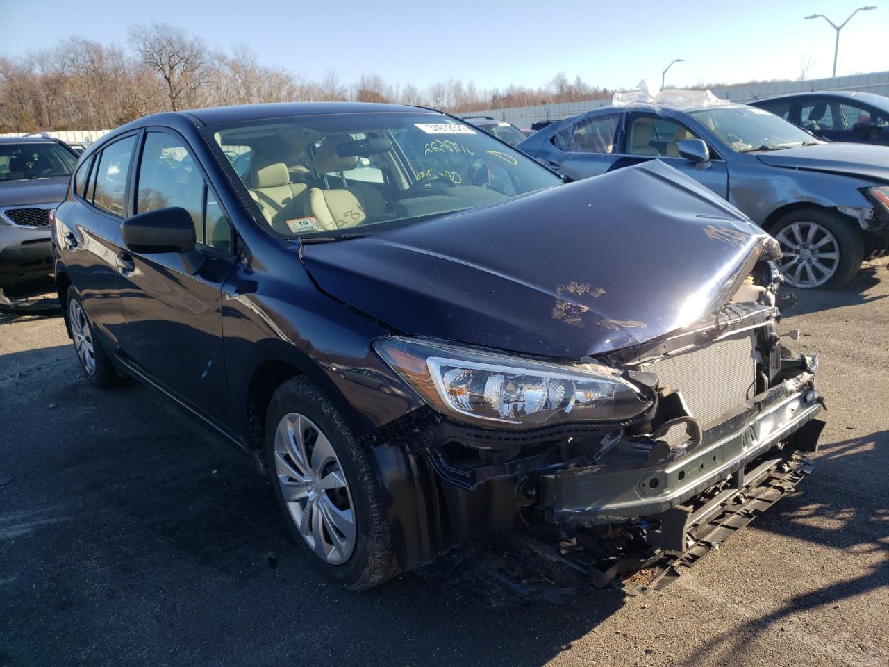 SUBARU IMPREZA 2019 with VIN 4S3GTAA64K3707232 - Photo from auction